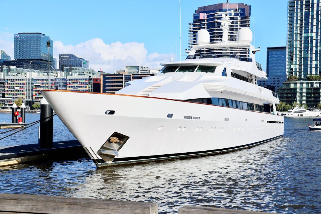 yacht with restored glossy finish docked at marina