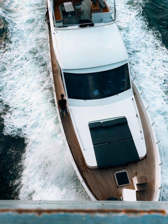 aerial view of a yacht in water showing a clean and maintained vessel