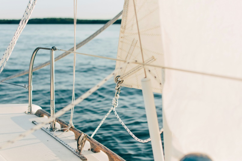 yacht in water with clean exterior and maintained finish