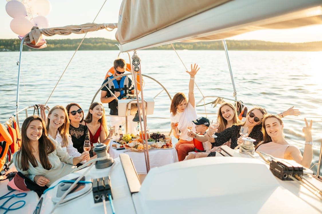 yacht deck prepared for event with clean surfaces and guests enjoying onboard space