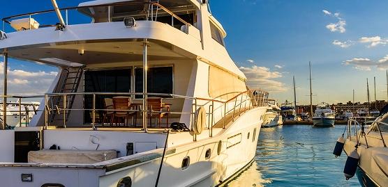 yacht docked at marina with clean exterior and maintained finish