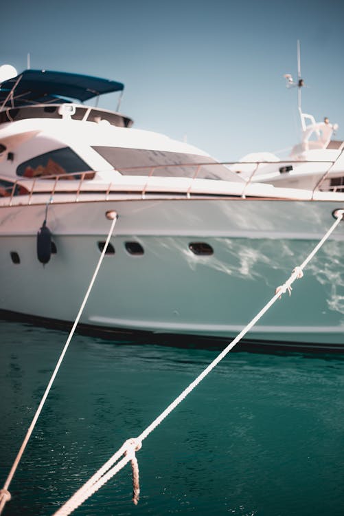 yacht docked at marina with clean exterior and maintained surfaces